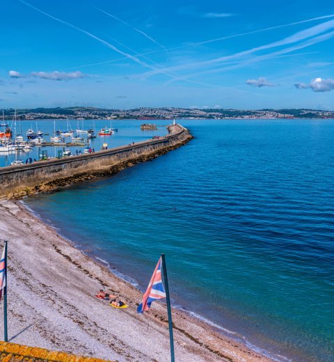 Breakwater Beach Brixham on a sunny day