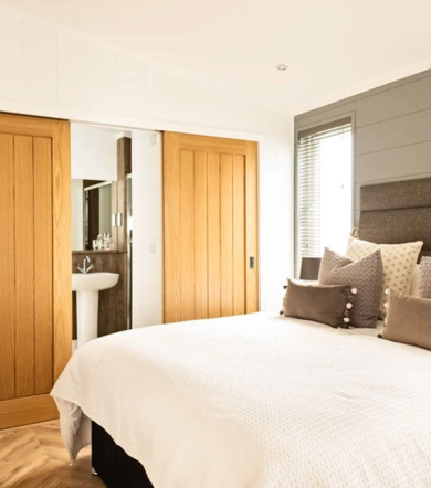 Prestige Dovecote, master bedroom looking into ensuite at Delamere