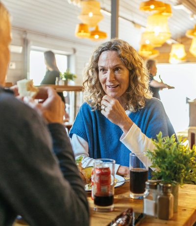 Couple talking over lunch at Finlake cafe