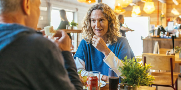 Couple talking over lunch at Finlake cafe