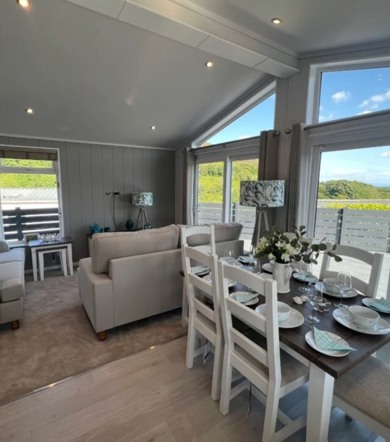 Prestige Oyster Catcher, living room patio doors at Talyfan
