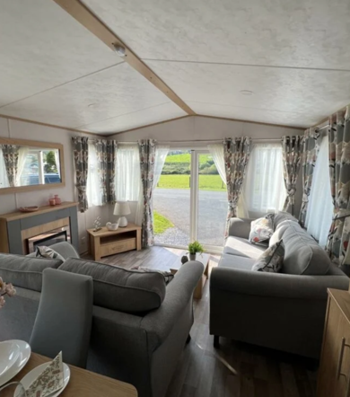 Carnaby Silverdale, living room patio doors at Talyfan