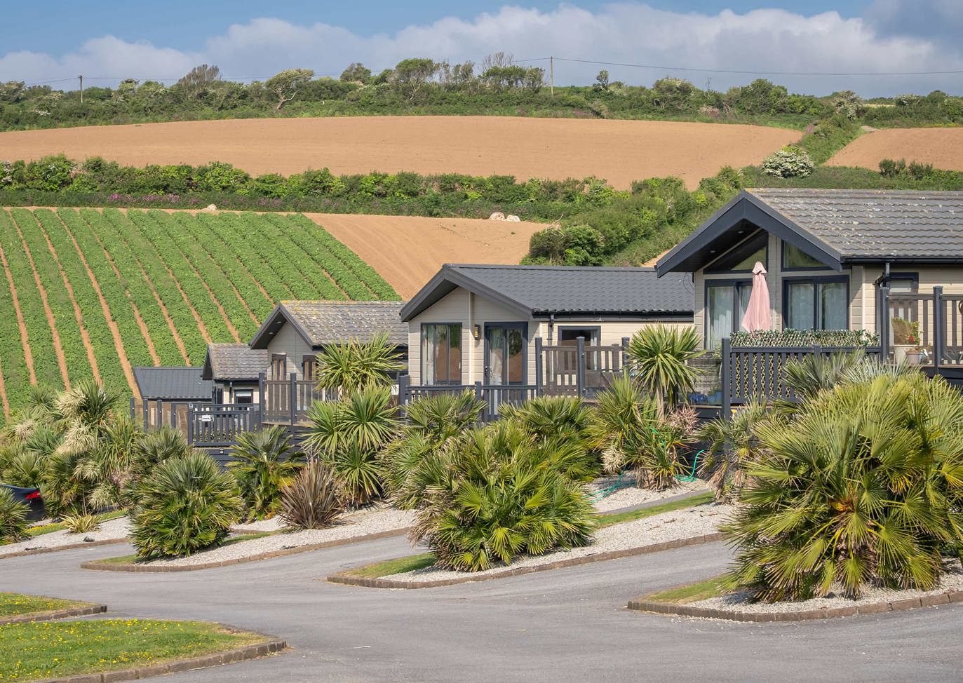 Praa Sands Overview Row Of Lodges In Front Of Fields