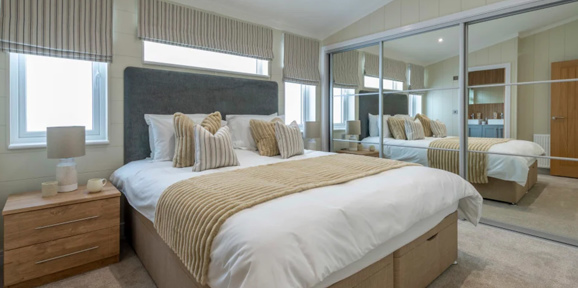 Wessex Contemporary master bedroom at The Warren