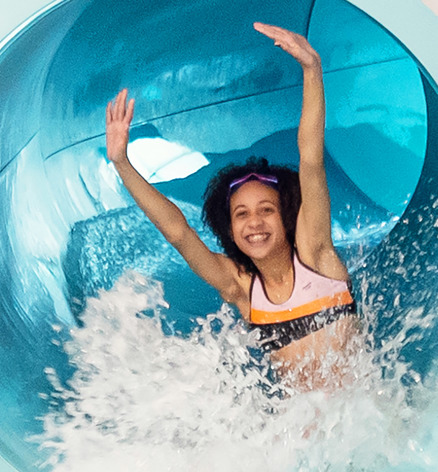 Girl sliding down Finlake Waterslide