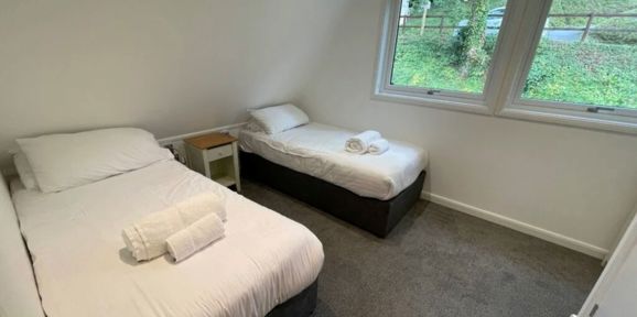 2 & 3 Bedroom A Frame, Twin Beds Window at Finlake