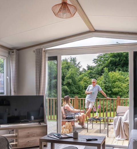 Dartmoor View Couple Outside Of Lodge