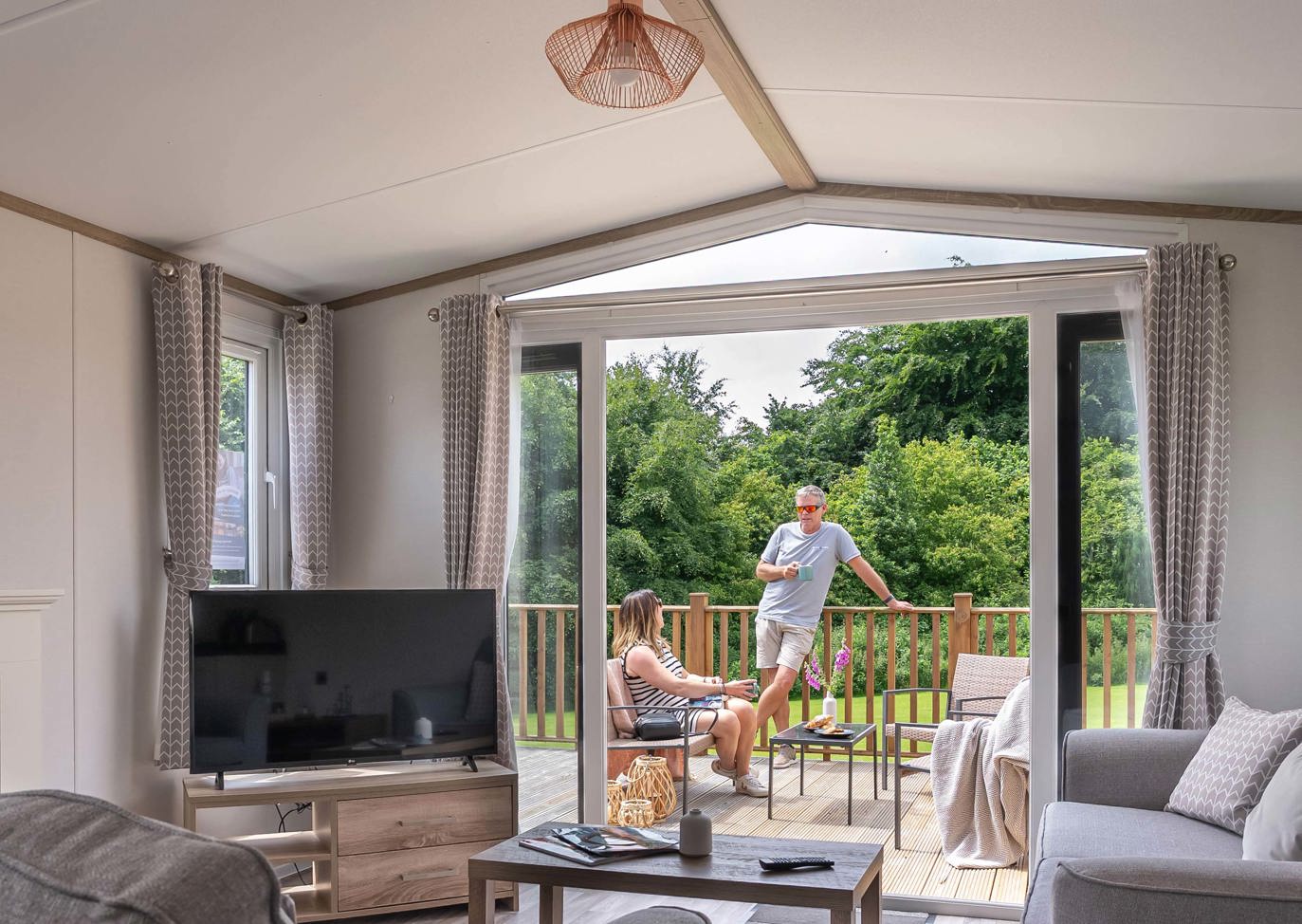 Dartmoor View Couple Outside Of Lodge