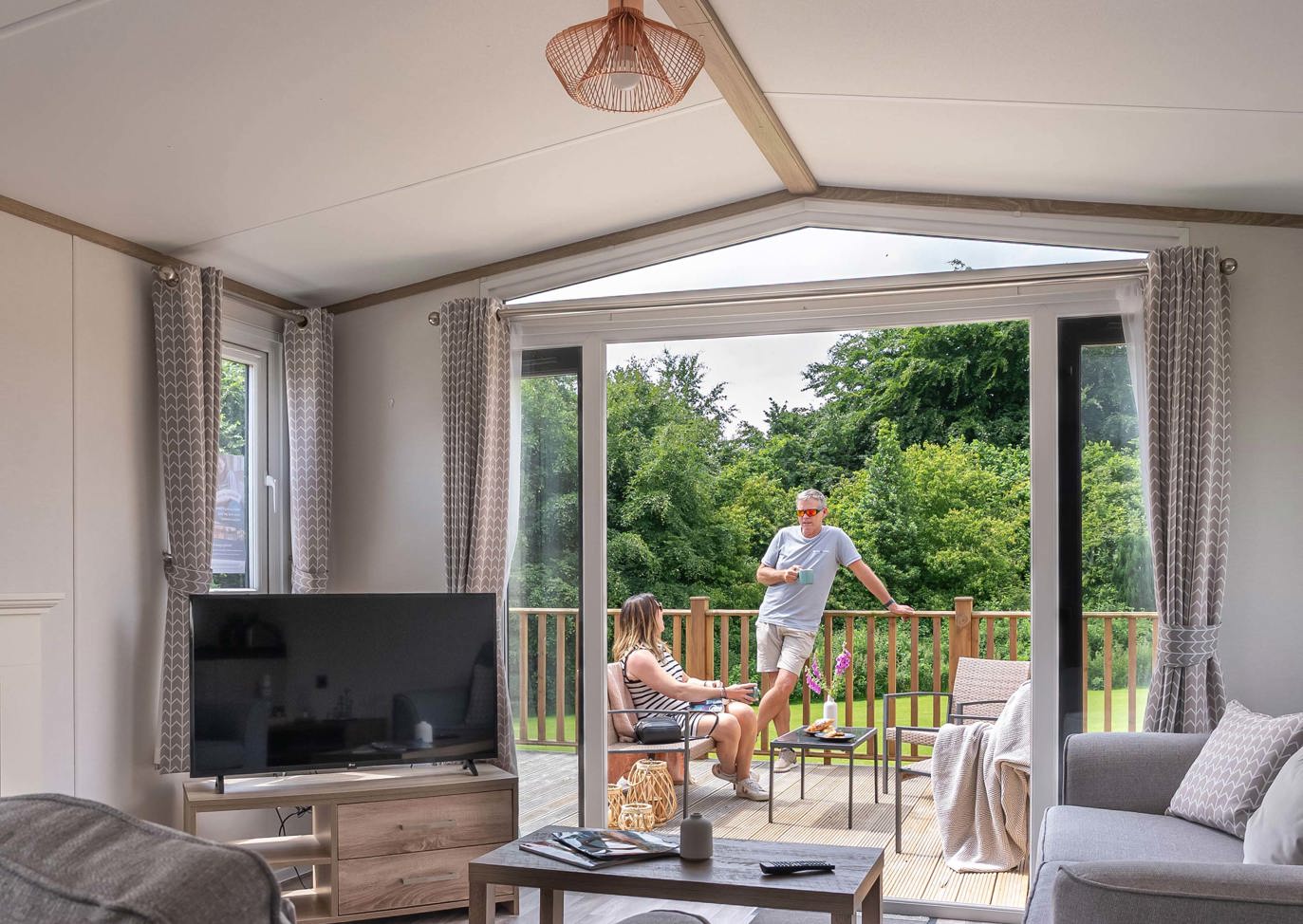 Dartmoor View Couple Outside Of Lodge