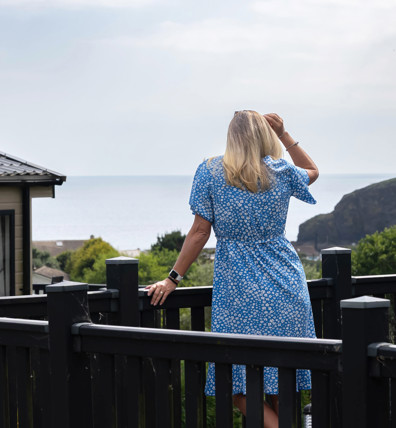 Praa Sands Lady Looking At From Balcony