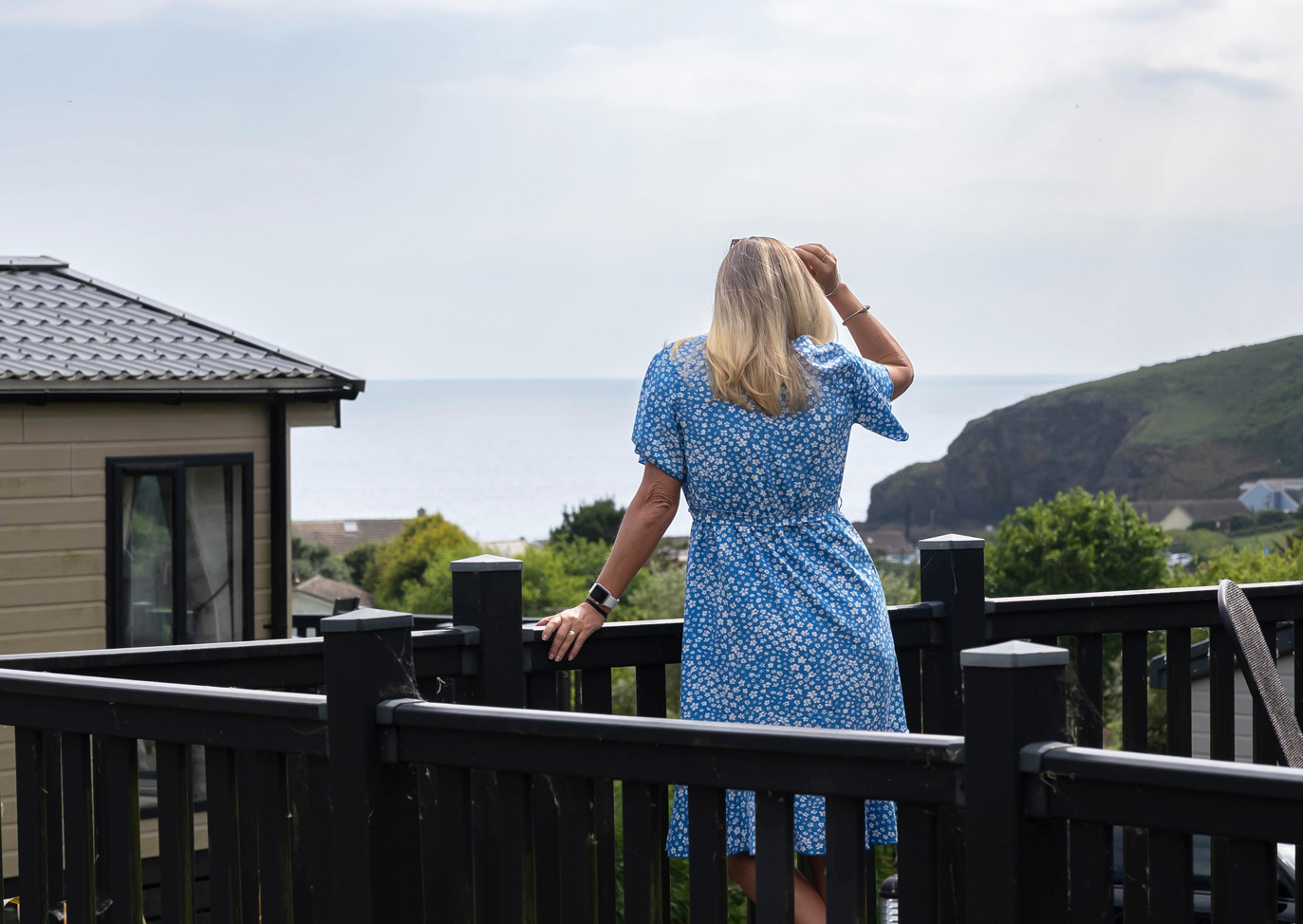 Praa Sands Lady Looking At From Balcony