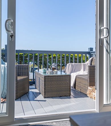ABI St David, patio doors onto decking area at Praa Sands