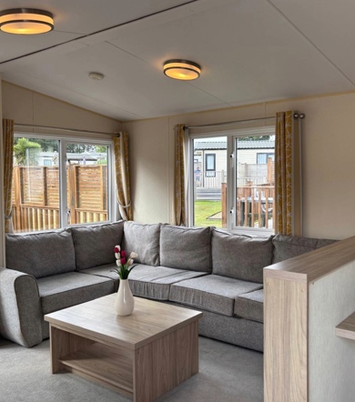 Regal Kingsbury, living room with corner sofa at Dartmoor View