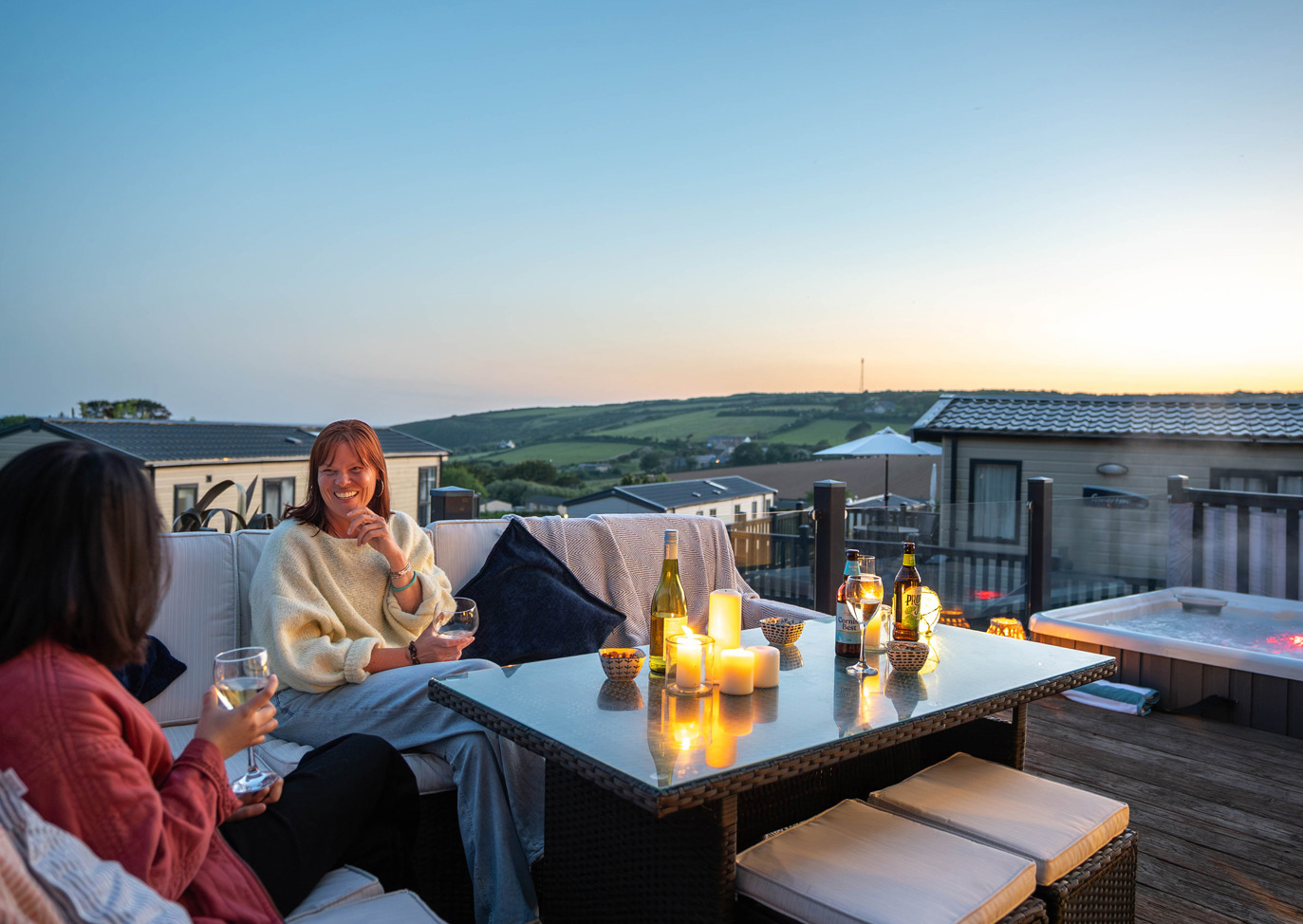 Praa Sands Friends Sunset Chatting On Patio