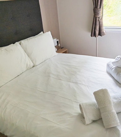 Carnaby Ashdale, double bed in master bedroom at Praa Sands