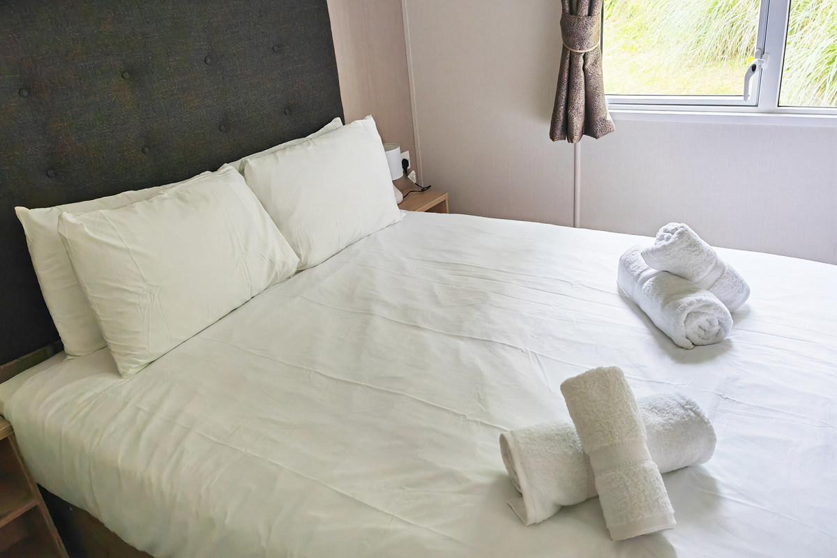 Carnaby Ashdale, double bed in master bedroom at Praa Sands