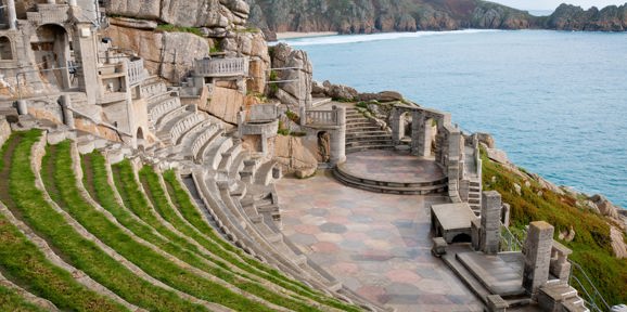 Iconic Minack Theatre carved into cliffs overlooking the ocean near Praa Sand Holiday Park.