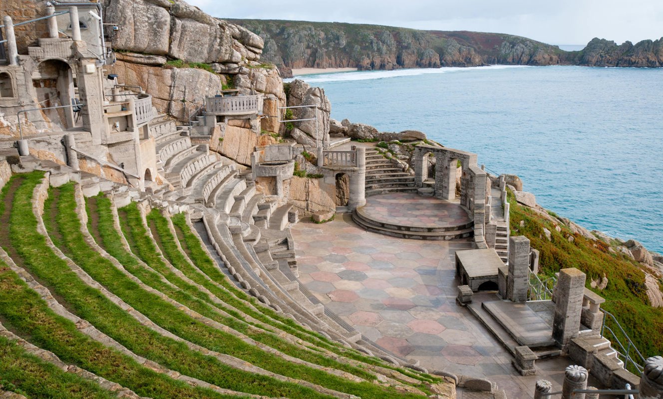 Iconic Minack Theatre carved into cliffs overlooking the ocean near Praa Sand Holiday Park.