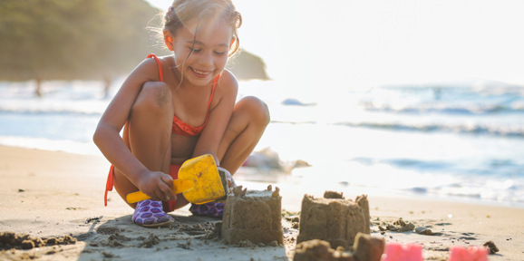 The Warren Local Area Little Girl Building A Sandcastle