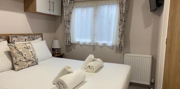 Carnaby Silverdale, master bedroom at Dartmoor View