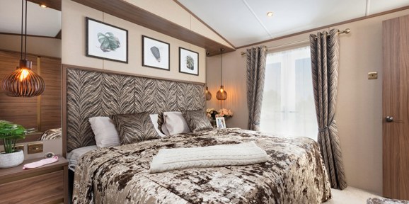 Carnaby Langham, double bed in master bedroom at Praa Sands