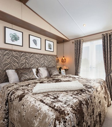 Carnaby Langham, double bed in master bedroom at Praa Sands