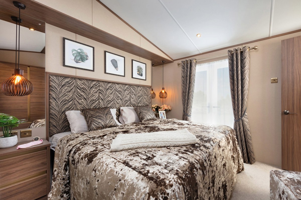 Carnaby Langham, double bed in master bedroom at Praa Sands