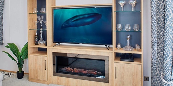 Carnaby Chantry, entertainment unit in lounge at Brokerswood