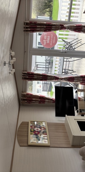 Carnaby Rosedale, patio doors and fireplace at Praa Sands