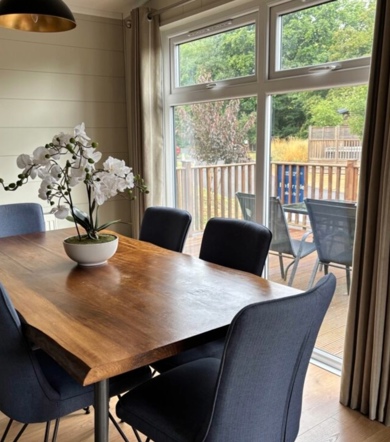 Prestige Dovecote, dining area at Brokerswood