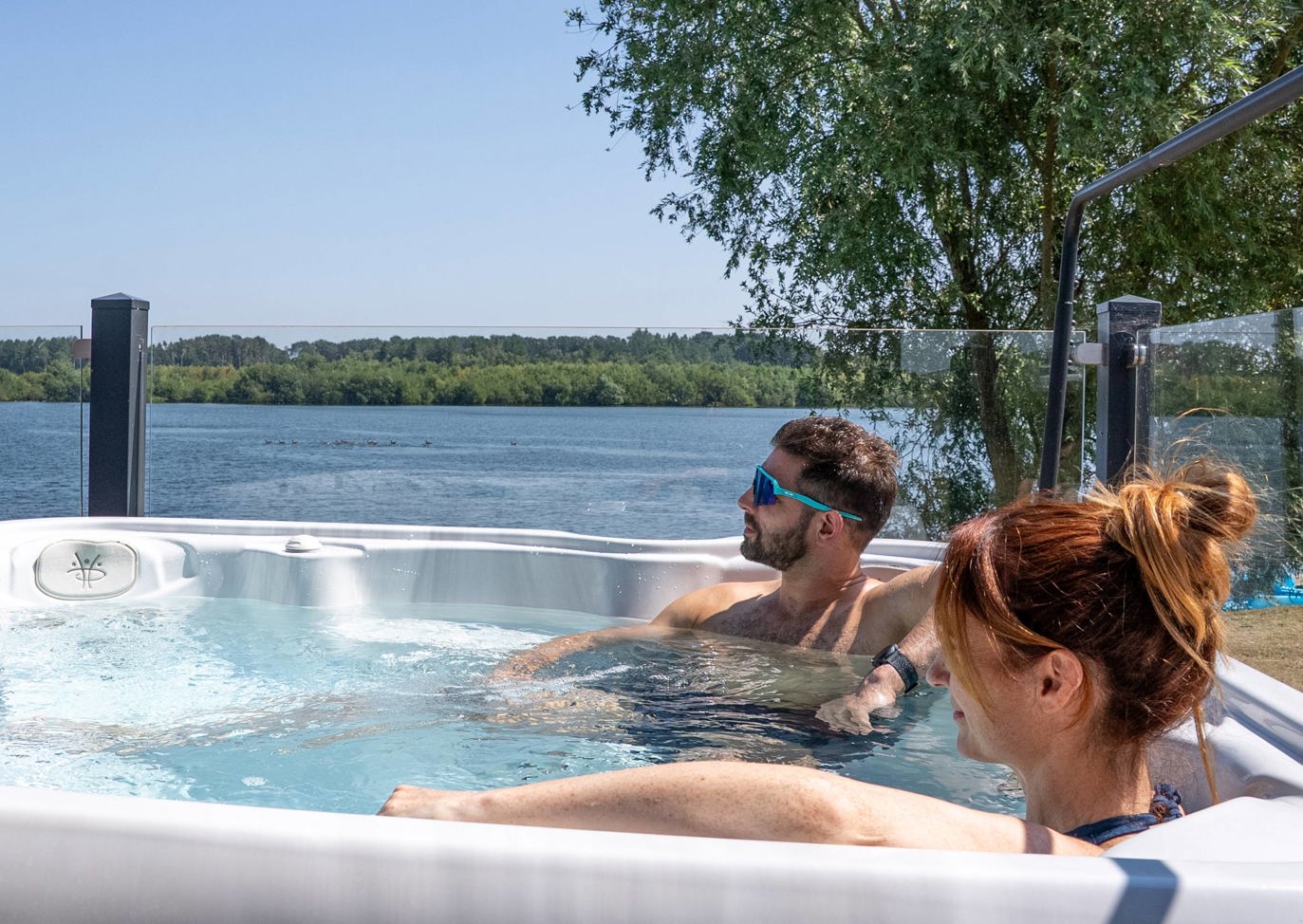 Delamere Couple In Hot Tub With Lake View