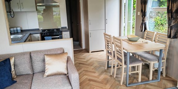 Carnaby Ashdale, dining table and sofa at Praa Sands