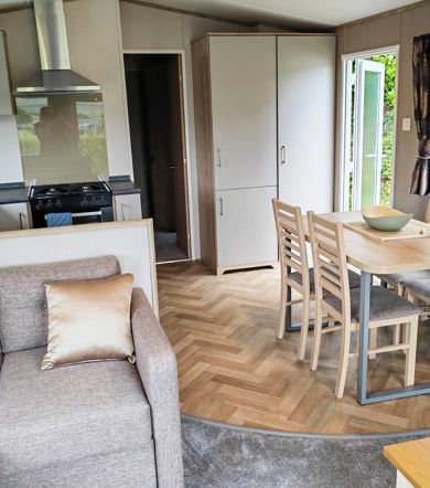 Carnaby Ashdale, dining table and sofa at Praa Sands