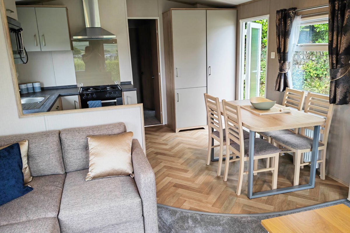 Carnaby Ashdale, dining table and sofa at Praa Sands