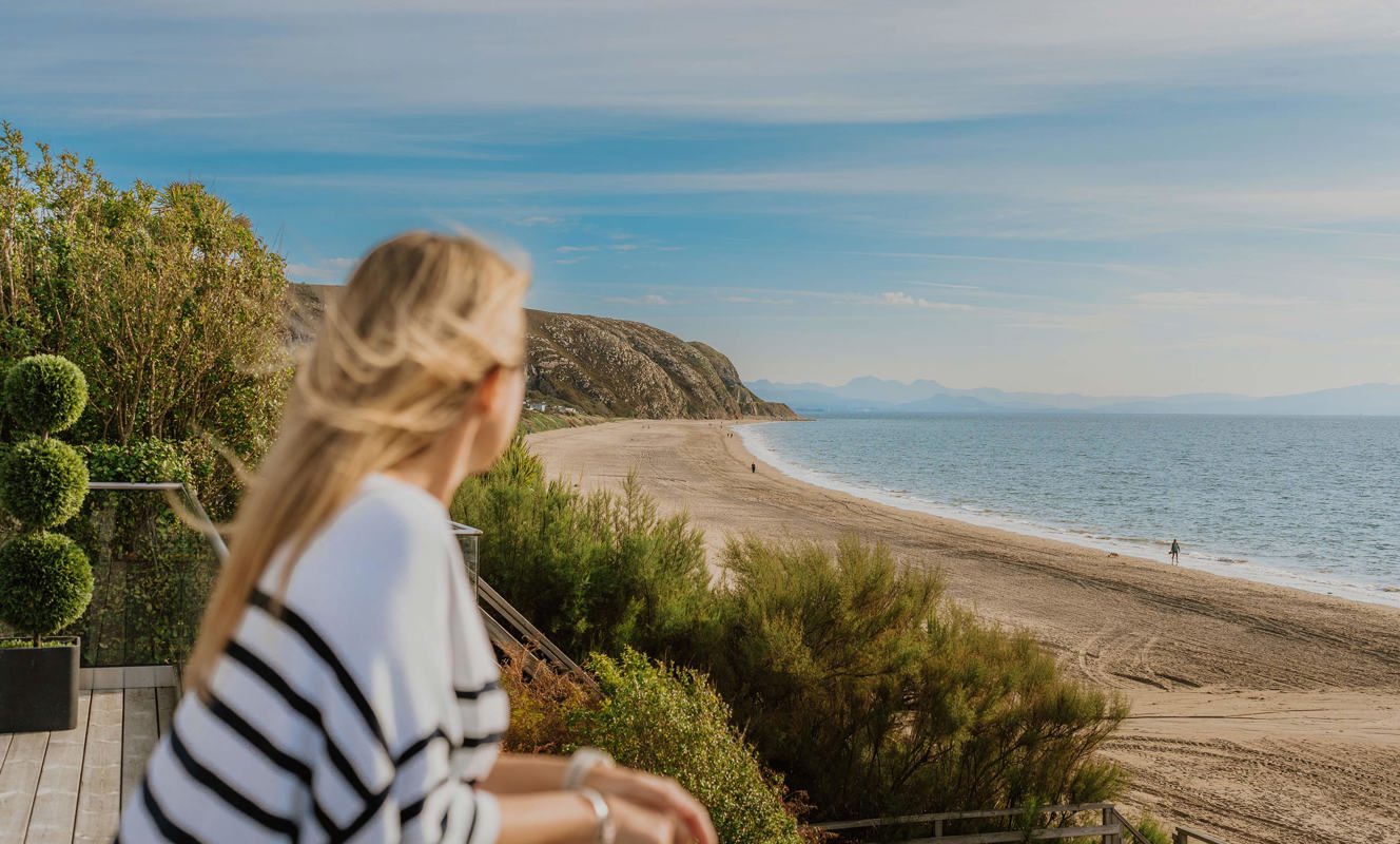 The Warren Lady Looking At The Sea And Beach