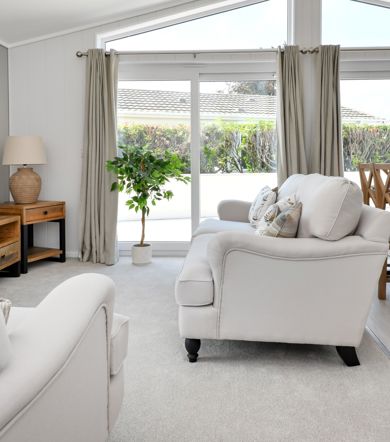 Prestige Oyster Catcher, patio doors in living room at The Warren Resort & Spa