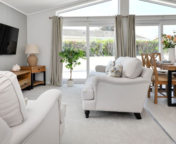 Prestige Oyster Catcher, patio doors in living room at The Warren Resort & Spa