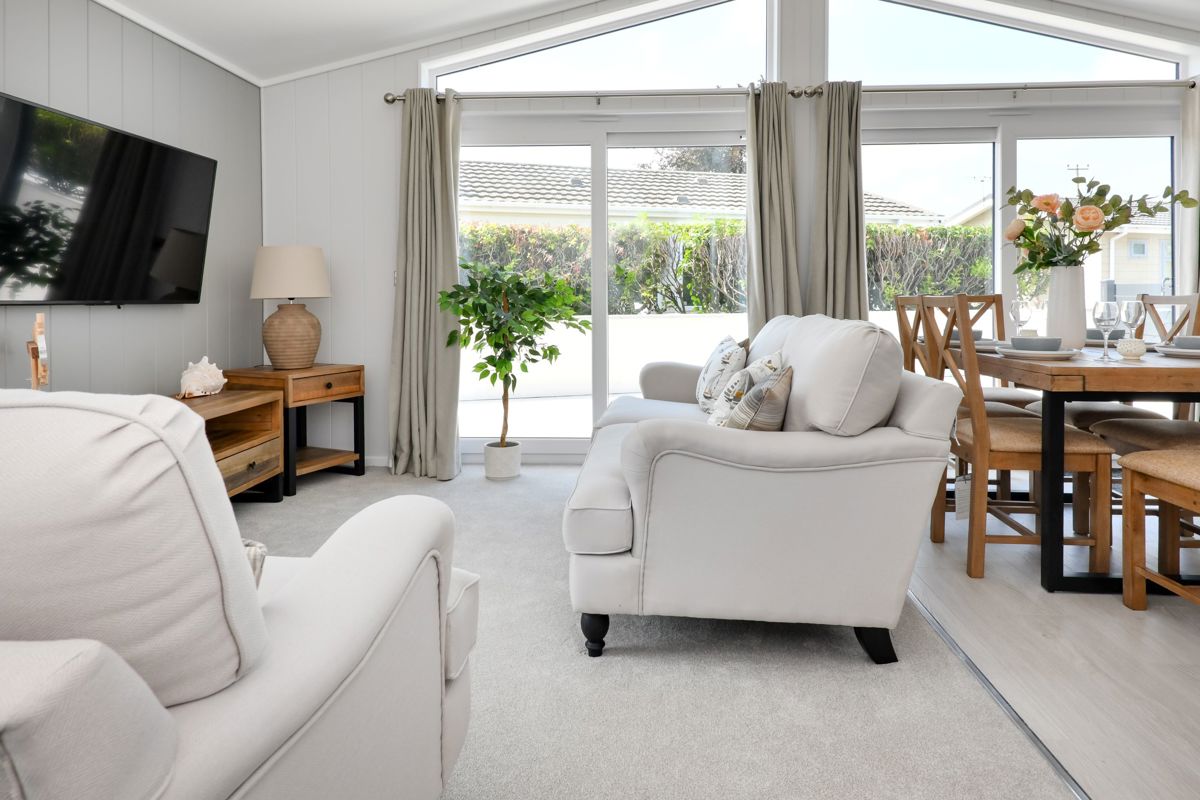 Prestige Oyster Catcher, patio doors in living room at The Warren Resort & Spa