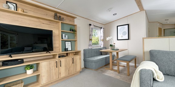ABI Coworth, entertainment unit with TV in lounge at Finlake