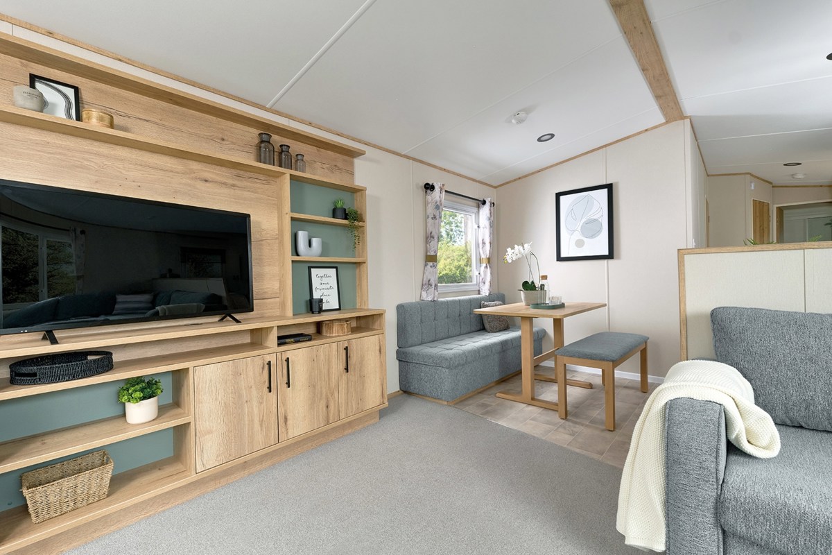 ABI Coworth, entertainment unit with TV in lounge at Finlake