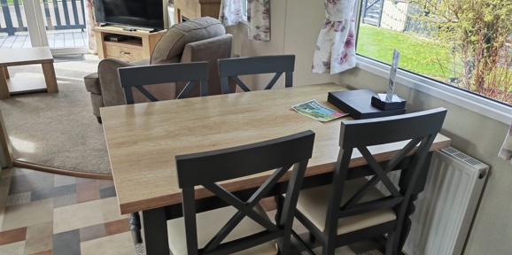 Carnaby Oakdale, table and TV at Praa Sands