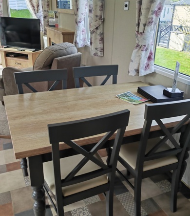 Carnaby Oakdale, table and TV at Praa Sands