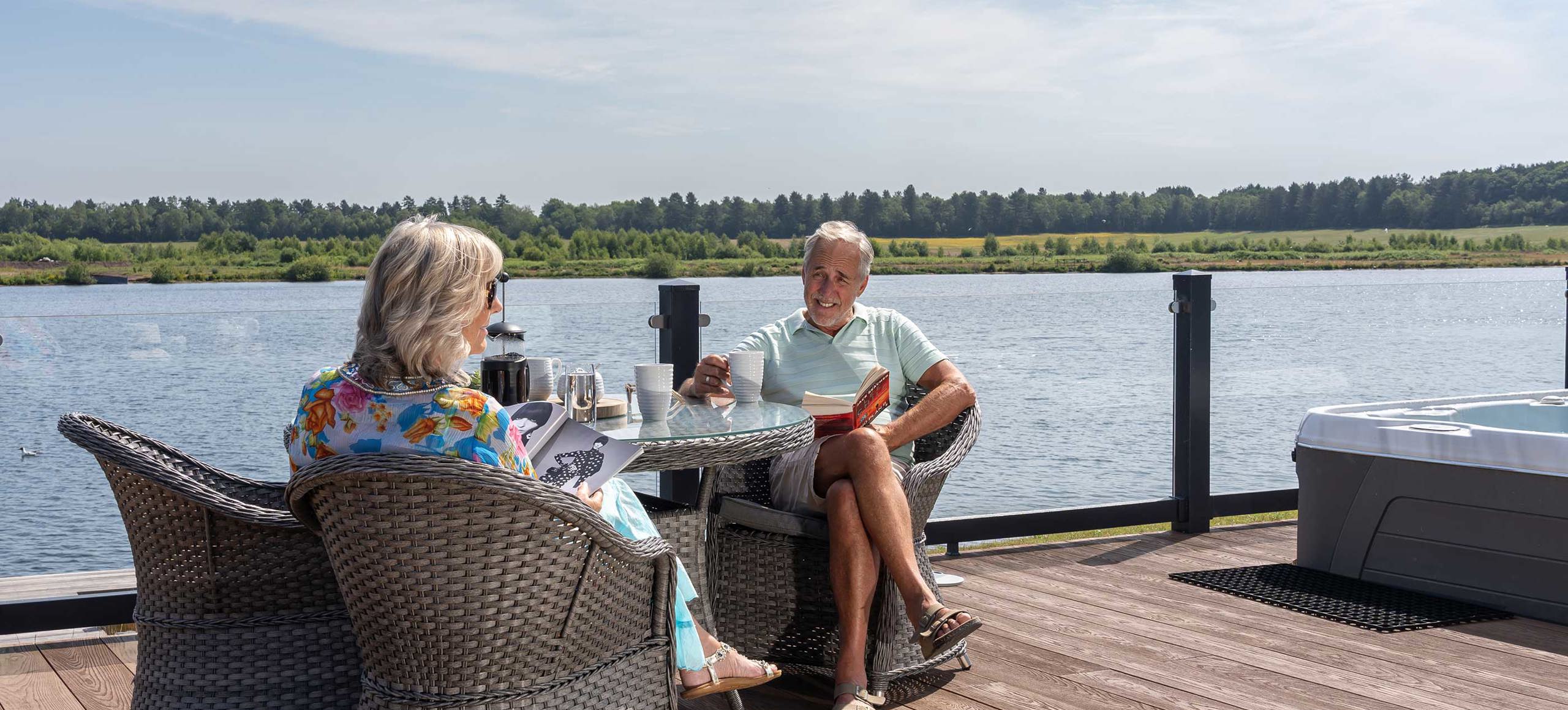 Delamere Couple Relaxing On Decking